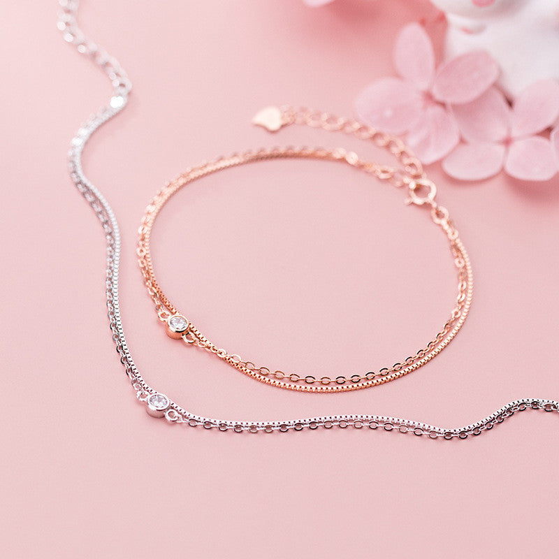 Bracelet à breloques rondes à double chaîne