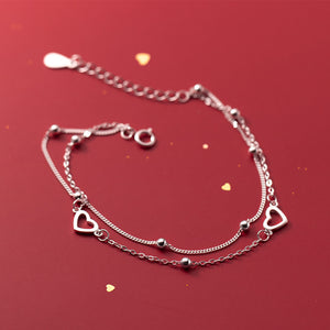 Bracelet de chaînes d'amour perlées
