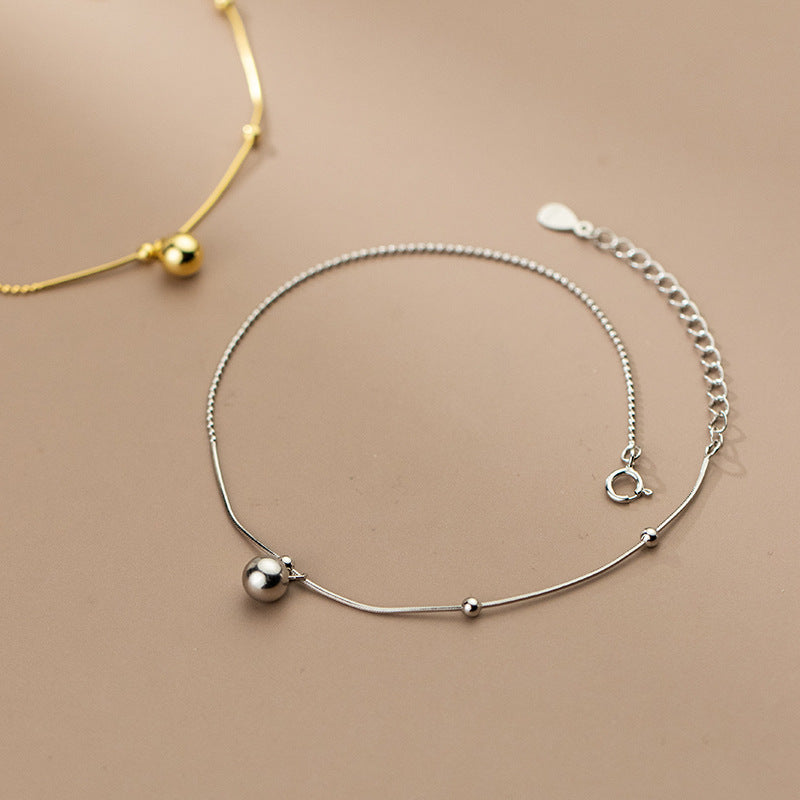 Glossy Snake Bone Bead Anklet