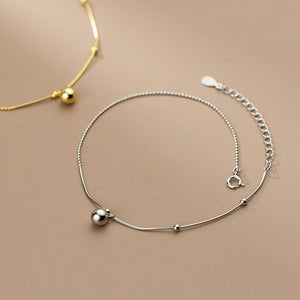 Glossy Snake Bone Bead Anklet